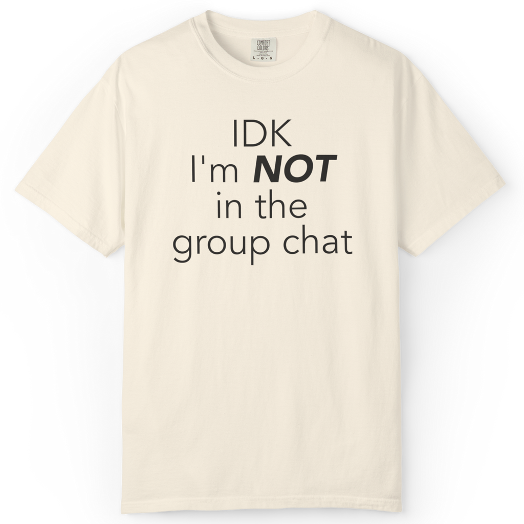 Neutral aesthetic graphic tee with relatable “not in the group chat” phrase