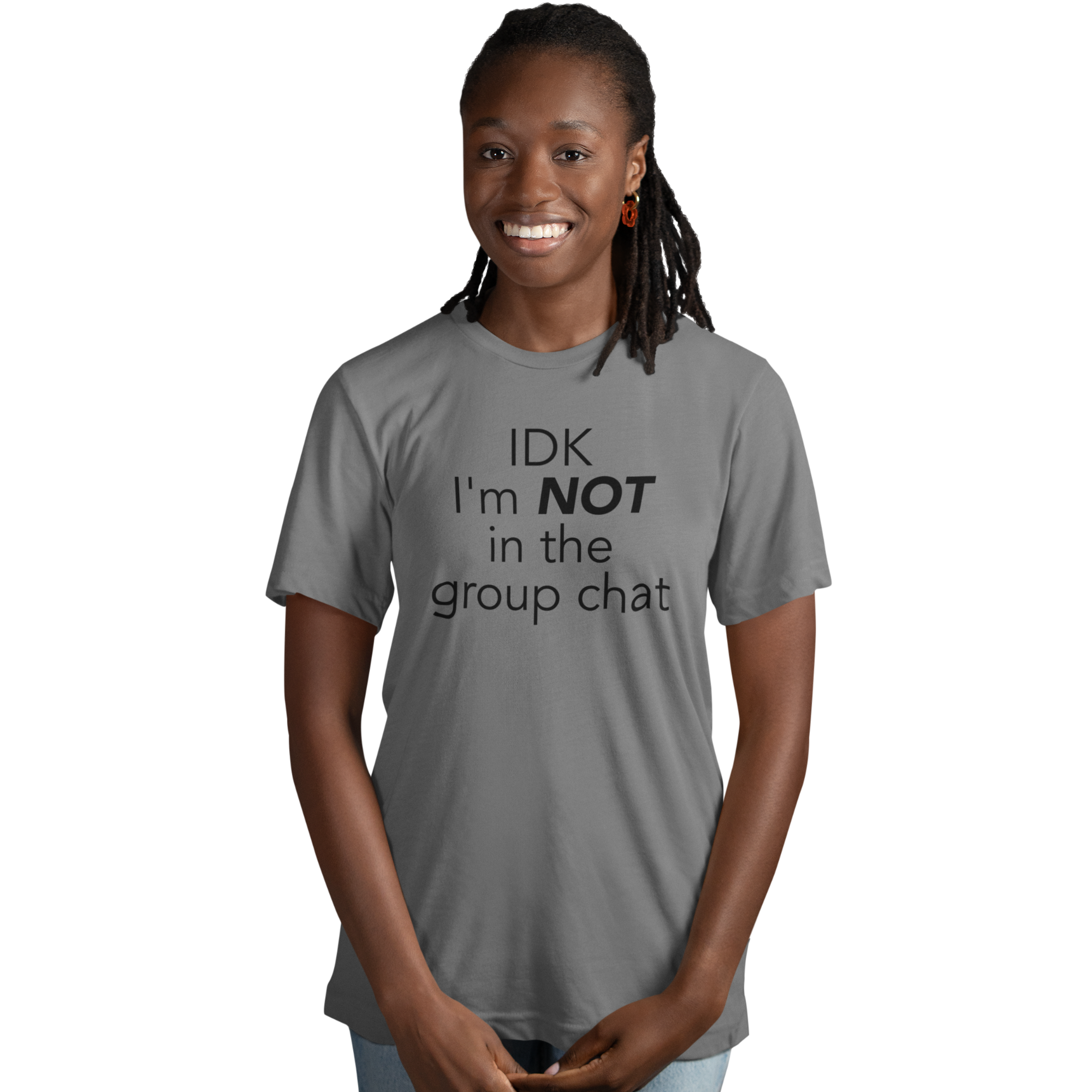 Casual outfit featuring “not in the group chat” graphic tee styled with jeans